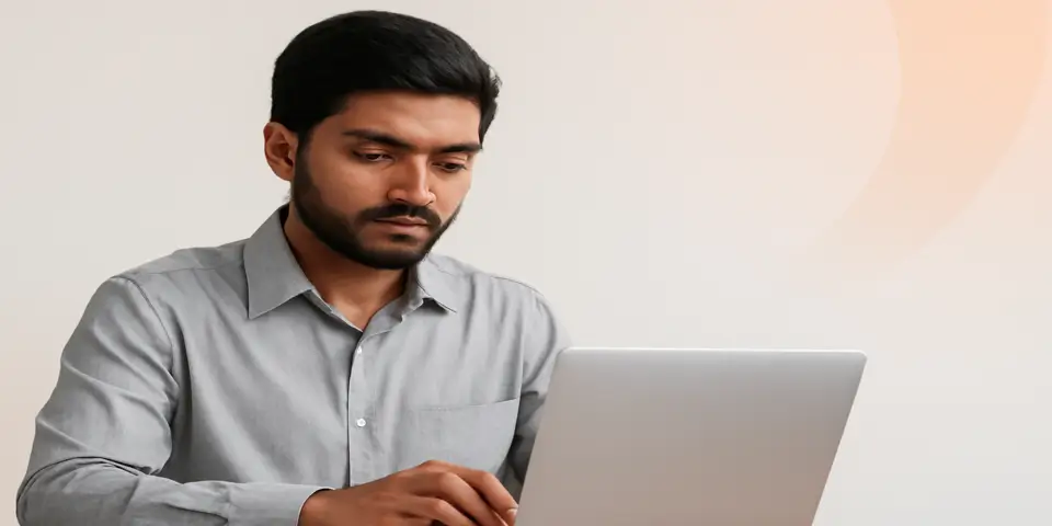 Professional analyzing outsourcing data on a laptop for business efficiency