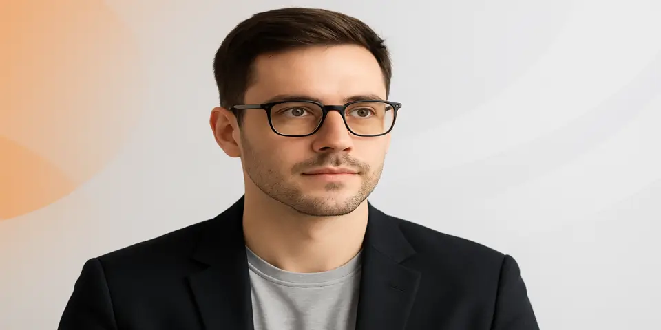 Professional using laptop to analyze 2025 IT trends