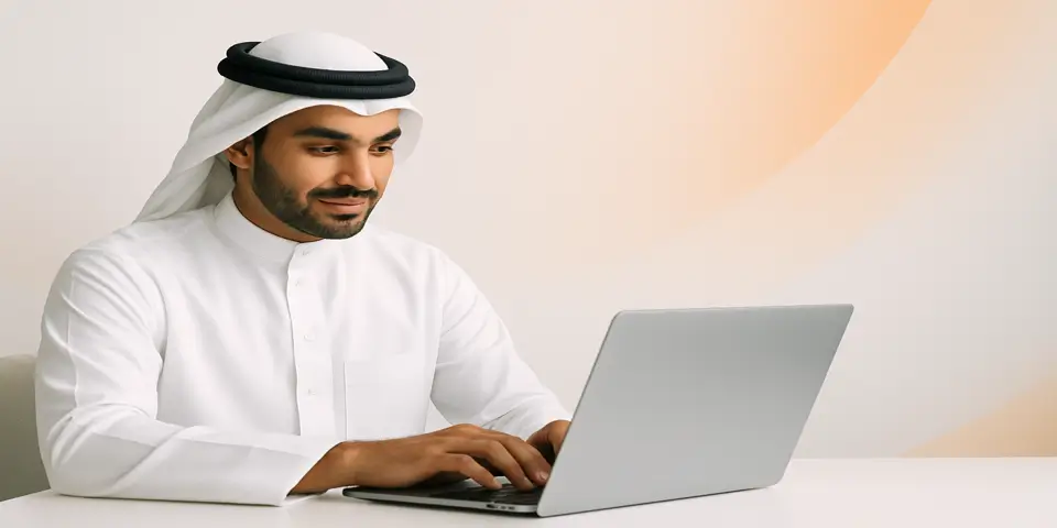 Professional reviewing IT performance metrics on a laptop.