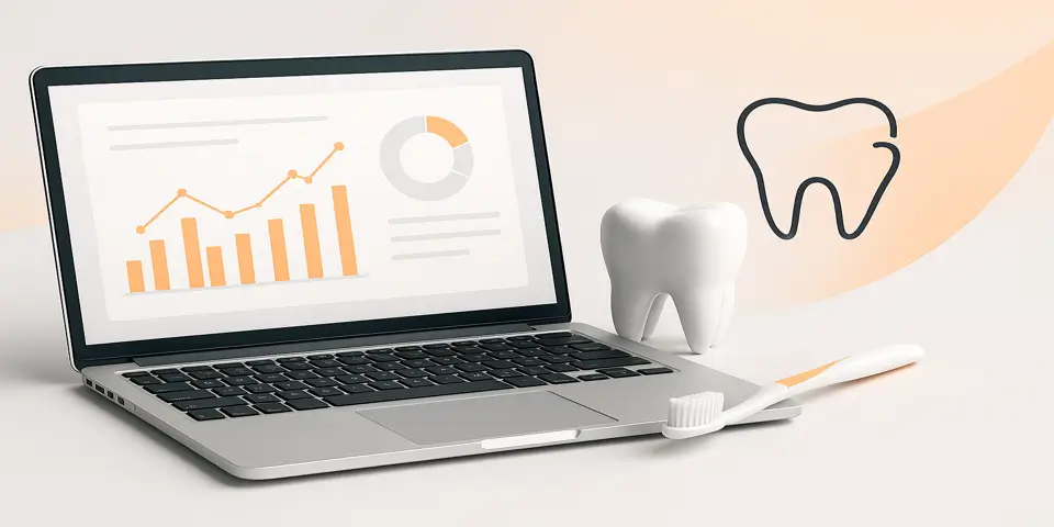 Laptop displaying dental website analytics and SEO dashboard.